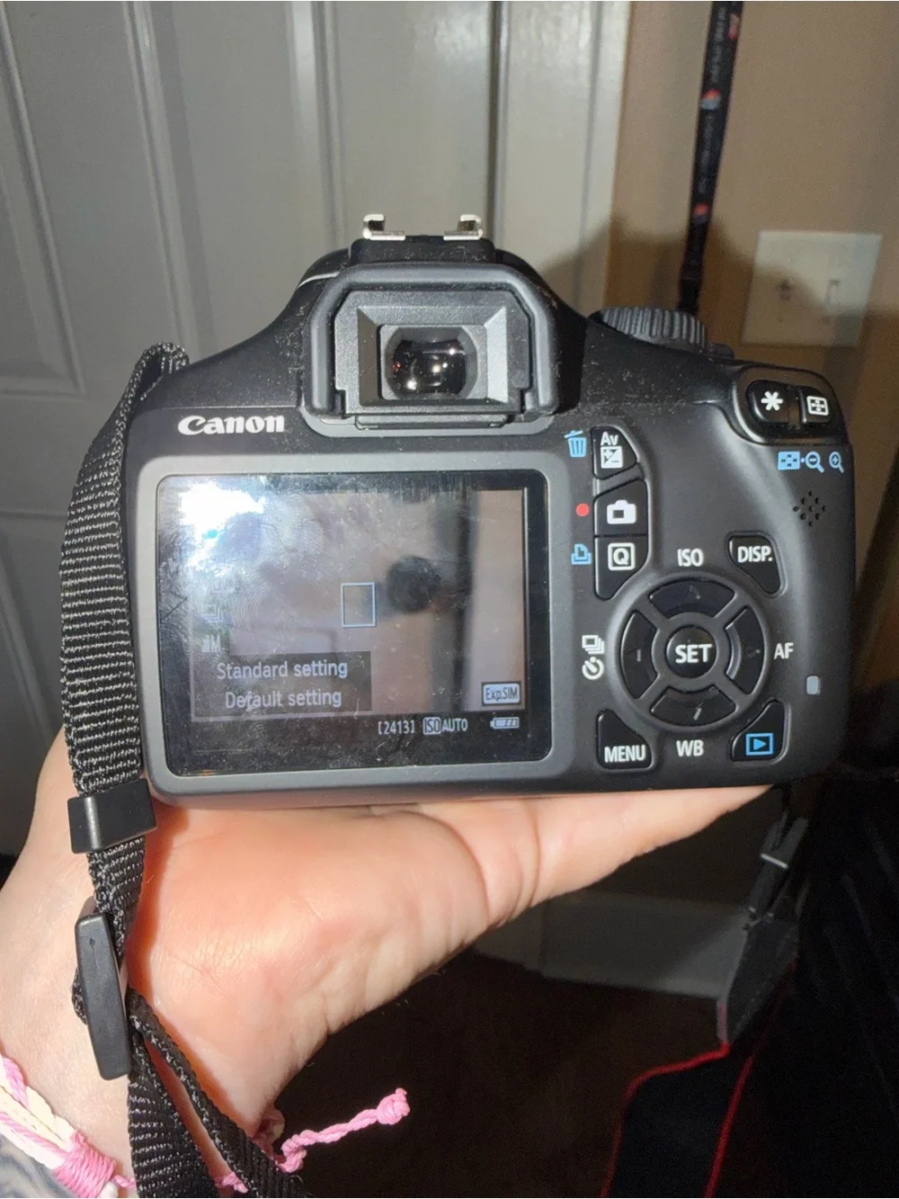 Canon Black DSLR with 18-55mm Zoom Lens